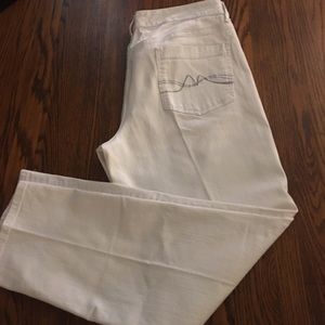 NY&Co Slim Slouch White Jeans. Sits on waist. Size 14 relaxed fitting.